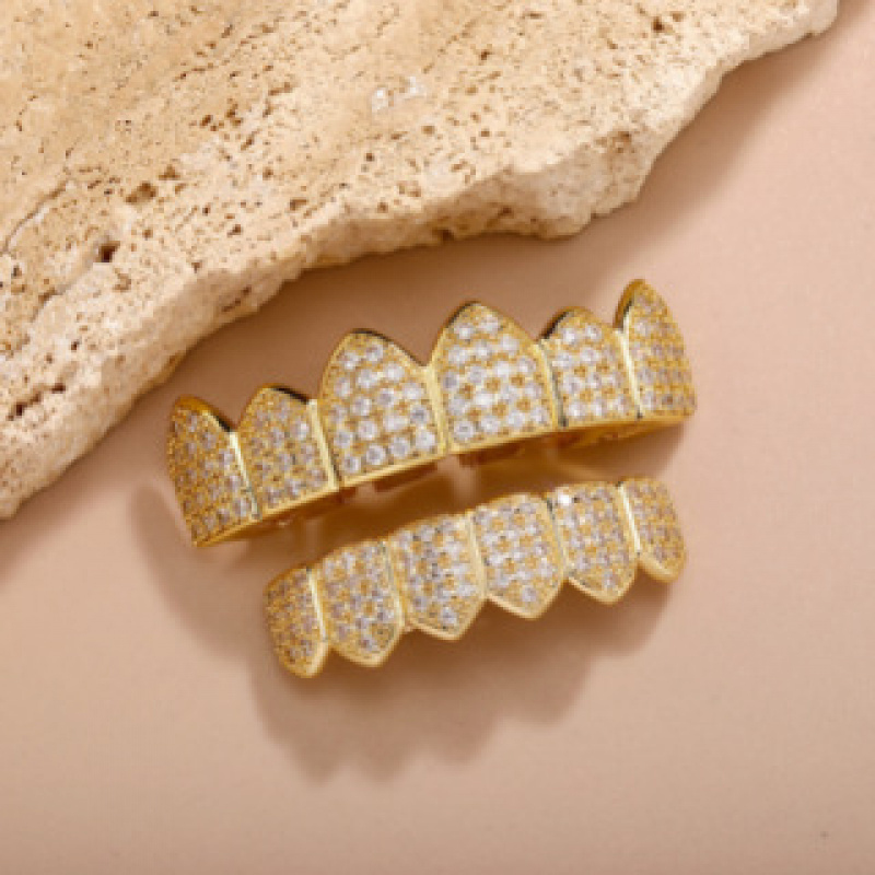 أطقم أسنان فاخرة جديدة مرصعة ب - مراجعة Body Jewelry Real Gold وسعره